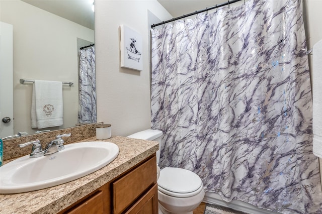 3504 Robin Rd, Ennis, TX 75119 - full bath with toilet, vanity, and a shower with shower curtain