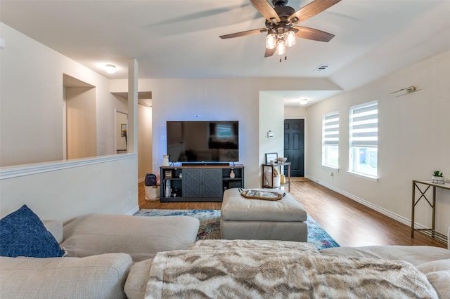 3504 Robin Rd, Ennis, TX 75119 - living room featuring wood finished floors, a ceiling fan, and baseboards