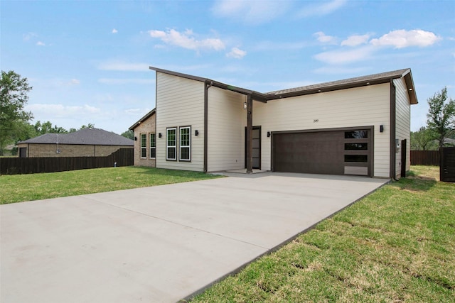 view of front facade featuring a garage and concrete driveway