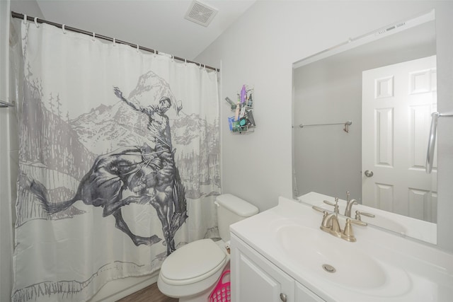 112 Wood St Unit A, Princeton, TX 75407 - bathroom featuring toilet, vanity, and a shower with shower curtain