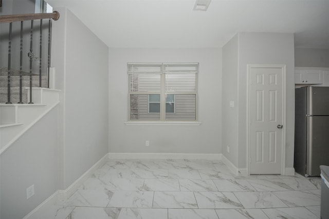 112 Wood St Unit A, Princeton, TX 75407 - interior space with light marble finish floors and baseboards