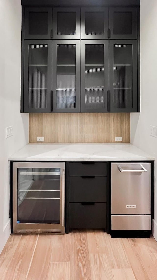 1596 Maple, Tyler, TX 75703 - bar area featuring wine cooler, dishwasher, and light wood-style floors