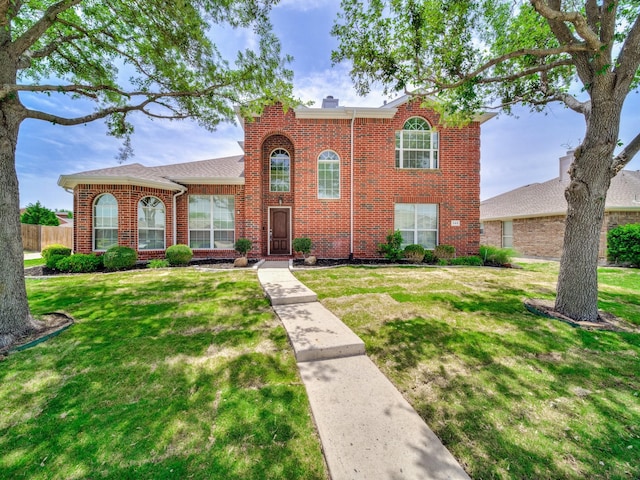 348 Kansas Trl, Murphy, TX 75094 - traditional home with brick siding and a chimney