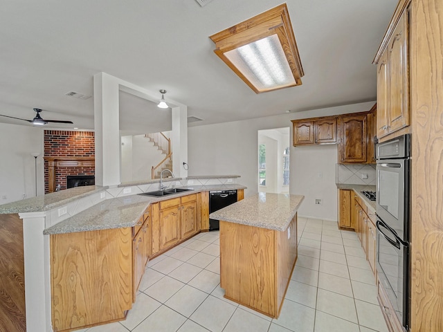 348 Kansas Trl, Murphy, TX 75094 - kitchen featuring a sink, a kitchen island, decorative backsplash, a ceiling fan, and double wall oven