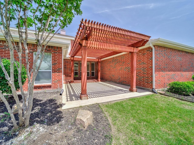 348 Kansas Trl, Murphy, TX 75094 - rear view of property featuring a pergola, brick siding, a patio area, and a tile roof