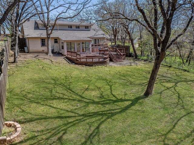 1031 S Fairbanks, Denison, TX 75020 - rear view of property featuring a wooden deck and roof with shingles