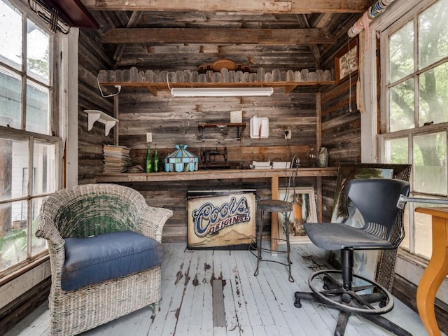 320 S Ward St, Italy, TX 76651 - sitting room with wood walls and hardwood / wood-style flooring