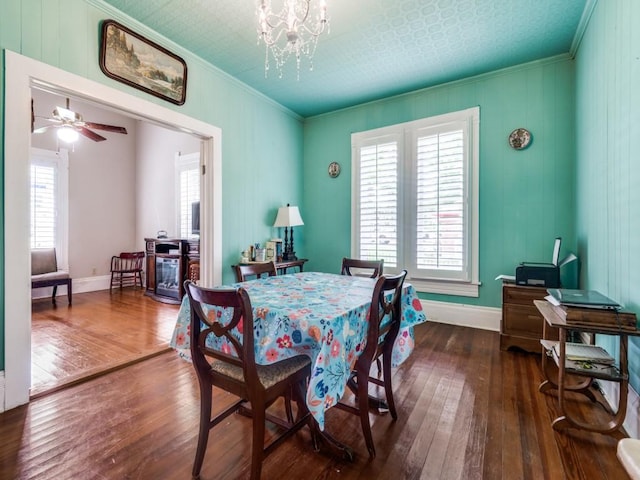 320 S Ward St, Italy, TX 76651 - dining room with hardwood / wood-style floors, ornamental molding, a chandelier, baseboards, and ceiling fan
