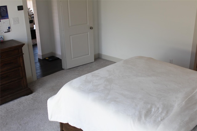4804 Garner Dr, Carrollton, TX 75010 - carpeted bedroom featuring baseboards