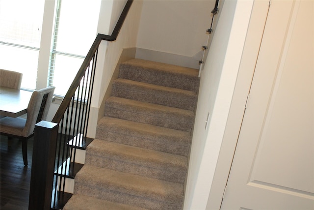 4804 Garner Dr, Carrollton, TX 75010 - stairway featuring wood finished floors