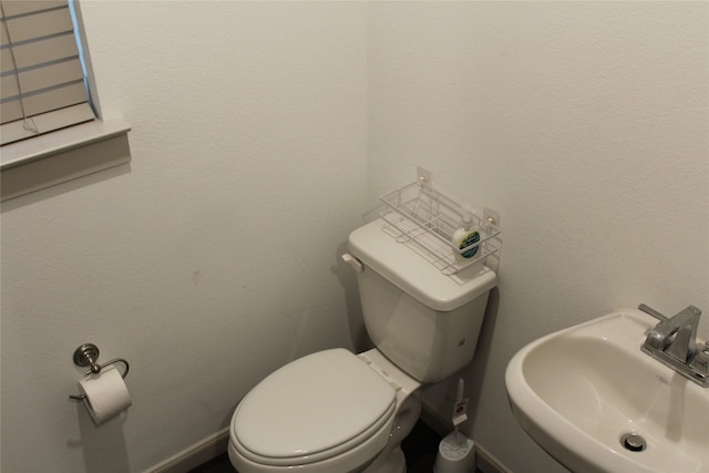 4804 Garner Dr, Carrollton, TX 75010 - bathroom with a sink and toilet