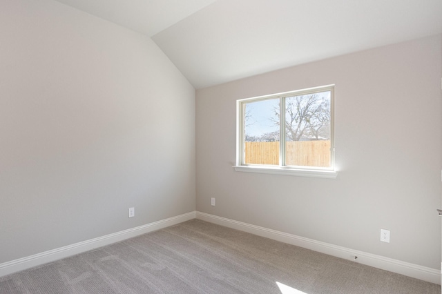 620 Alaina Dr, Desoto, TX 75115 - empty room featuring light carpet, baseboards, and lofted ceiling
