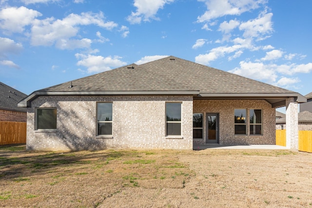 620 Alaina Dr, Desoto, TX 75115 - rear view of property with a patio, roof with shingles, and brick siding