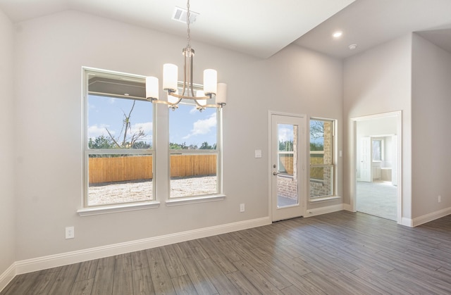620 Alaina Dr, Desoto, TX 75115 - unfurnished dining area with a chandelier, baseboards, wood finished floors, recessed lighting, and lofted ceiling