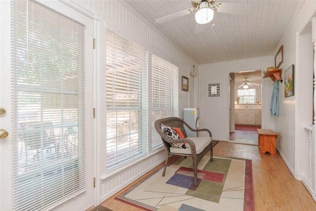 226 Highland Dr, Decatur, TX 76234 - sitting room with a ceiling fan, light wood-type flooring, and crown molding