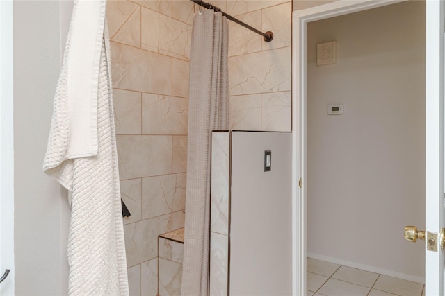 226 Highland Dr, Decatur, TX 76234 - bathroom with a tile shower and tile patterned floors