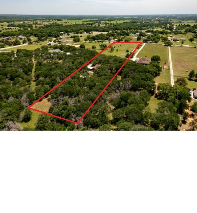226 Highland Dr, Decatur, TX 76234 - aerial view of property and surrounding area featuring property boundaries highlighted