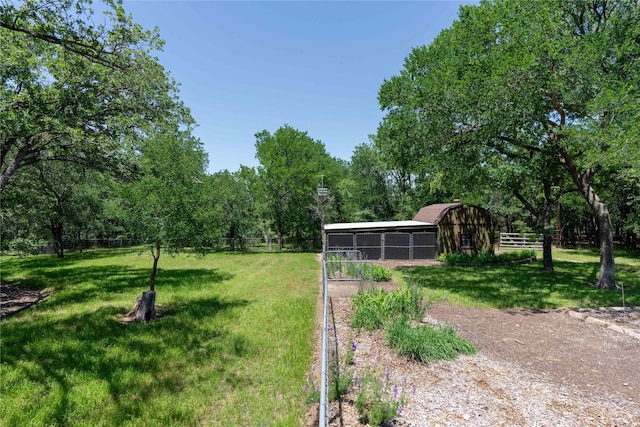 226 Highland Dr, Decatur, TX 76234 - view of yard with an outbuilding