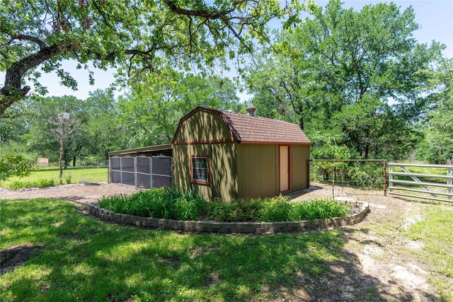 226 Highland Dr, Decatur, TX 76234 - view of outdoor structure with an outbuilding and a carport