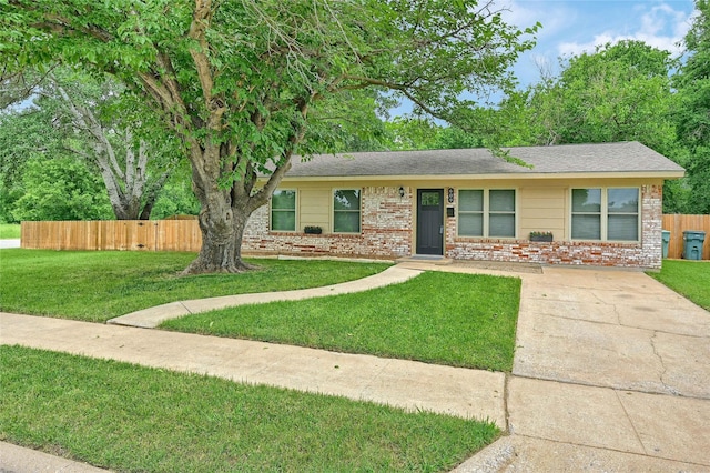 609 E Martin Ln, Sherman, TX 75090 - view of front of house with brick siding and a shingled roof