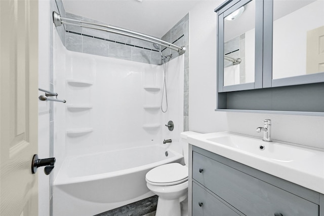 609 E Martin Ln, Sherman, TX 75090 - full bathroom with toilet, vanity, wood finished floors, and shower / bath combination
