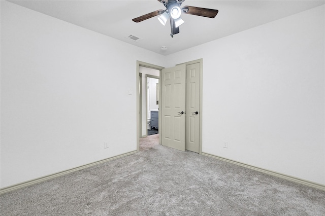 609 E Martin Ln, Sherman, TX 75090 - empty room featuring light carpet, a ceiling fan, baseboards, and a smoke detector