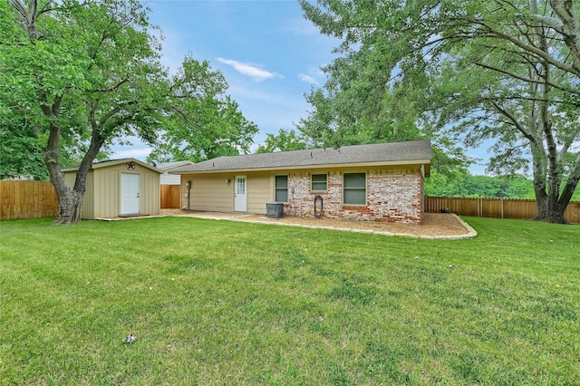 609 E Martin Ln, Sherman, TX 75090 - back of property with a storage unit and an outbuilding