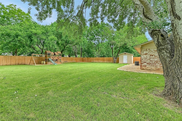 609 E Martin Ln, Sherman, TX 75090 - view of yard with a playground, a shed, and an outbuilding