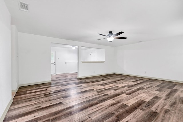 609 E Martin Ln, Sherman, TX 75090 - unfurnished room with wood finished floors, ceiling fan, and baseboards