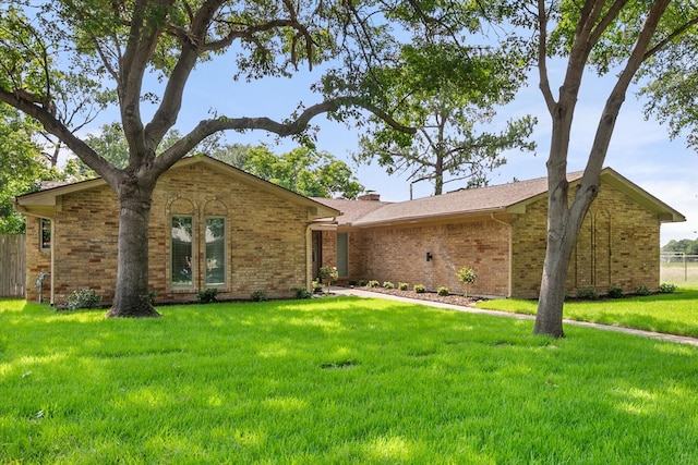 2000 Stacey Ct, Arlington, TX 76013 - view of front of home featuring brick siding and a front lawn