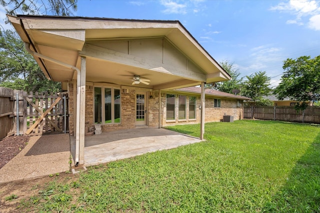 2000 Stacey Ct, Arlington, TX 76013 - back of house featuring ceiling fan, brick siding, and a patio