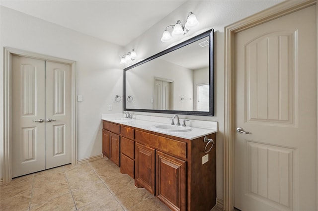 6824 San Fernando Dr, Fort Worth, TX 76131 - bathroom featuring double vanity and tile patterned floors