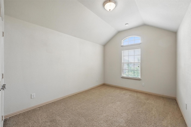 6824 San Fernando Dr, Fort Worth, TX 76131 - additional living space with lofted ceiling, light carpet, and baseboards