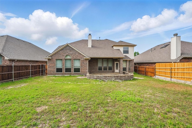6824 San Fernando Dr, Fort Worth, TX 76131 - rear view of property featuring brick siding, a patio area, and a chimney