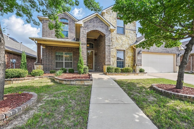 6824 San Fernando Dr, Fort Worth, TX 76131 - traditional-style home with stone siding, concrete driveway, a front lawn, and brick siding