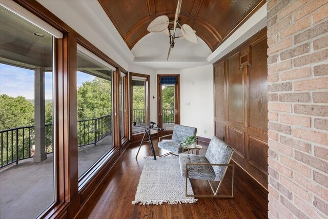 6908 Ridgewood Dr, Fort Worth, TX 76132 - sunroom with vaulted ceiling, wood finished floors, and baseboards
