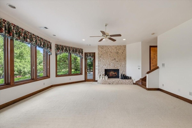 6908 Ridgewood Dr, Fort Worth, TX 76132 - unfurnished living room with carpet flooring, baseboards, a ceiling fan, recessed lighting, and a fireplace