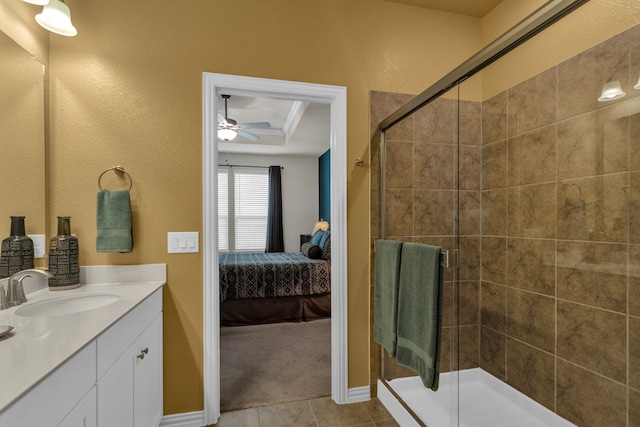 2420 Rooster Ln, Northlake, TX 76247 - full bathroom featuring ensuite bath, a shower stall, ceiling fan, vanity, and tile patterned floors