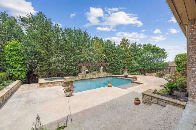 view of swimming pool with a patio area, a fenced backyard, and a pool with connected hot tub