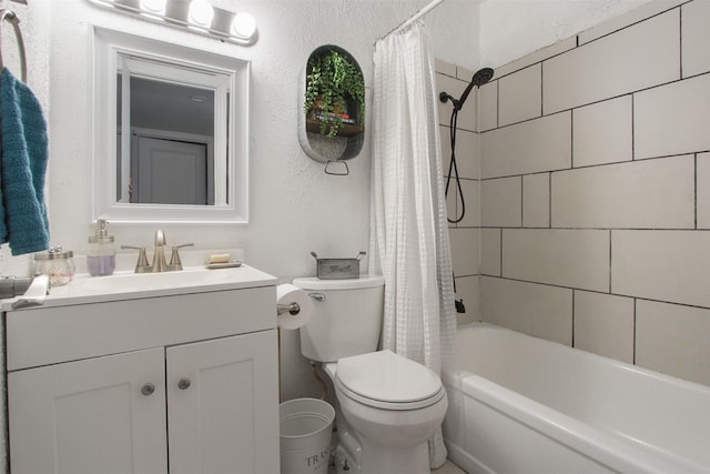 917 Park E Cir, Garland, TX 75043 - full bath featuring a textured wall, toilet, shower / bath combination with curtain, and vanity
