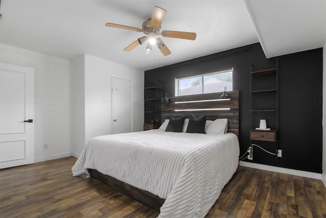 917 Park E Cir, Garland, TX 75043 - bedroom with wood finished floors, a ceiling fan, and baseboards