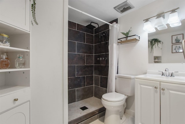 917 Park E Cir, Garland, TX 75043 - bathroom featuring tiled shower, toilet, and vanity