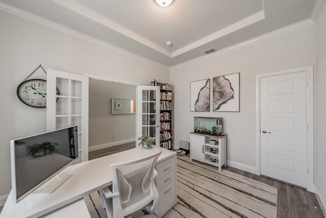 233 Honey Brook Ln, Aledo, TX 76008 - home office with a tray ceiling, light wood-style floors, ornamental molding, and baseboards