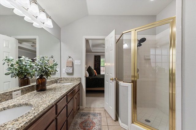 110 Stanford, Forney, TX 75126 - full bath featuring ensuite bath, a stall shower, tile patterned floors, double vanity, and vaulted ceiling