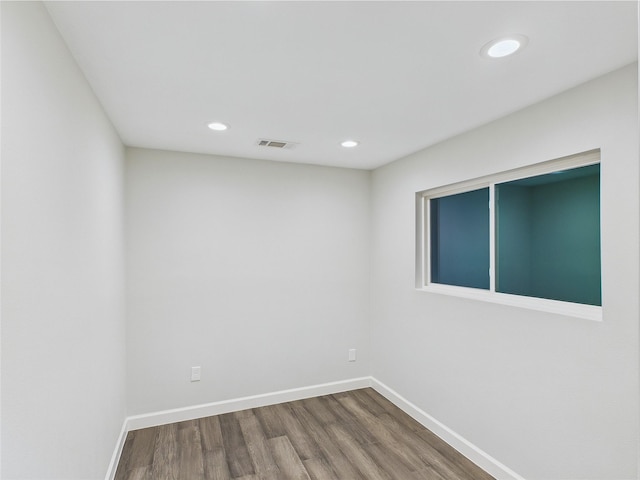 7323 Whispering Pines Dr, Dallas, TX 75248 - unfurnished room with wood finished floors, baseboards, and recessed lighting