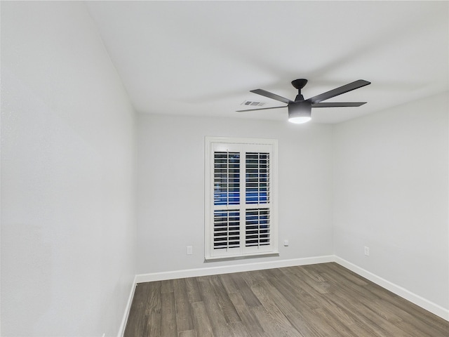7323 Whispering Pines Dr, Dallas, TX 75248 - unfurnished room featuring wood finished floors, baseboards, and ceiling fan