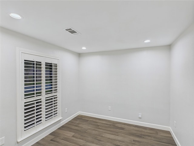7323 Whispering Pines Dr, Dallas, TX 75248 - spare room with dark wood-type flooring, recessed lighting, and baseboards