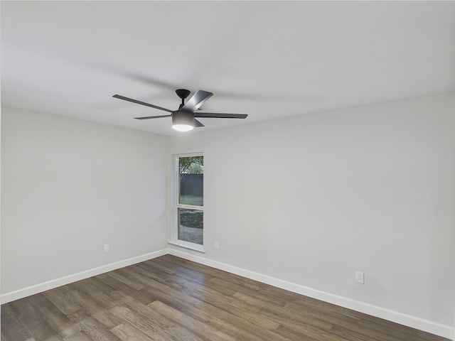 7323 Whispering Pines Dr, Dallas, TX 75248 - spare room with dark wood-style flooring, baseboards, and a ceiling fan