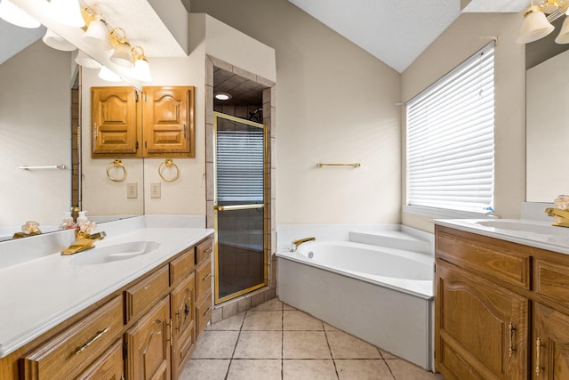 10201 Buffalo Grove Rd, Fort Worth, TX 76108 - full bathroom with two vanities, a stall shower, a garden tub, lofted ceiling, and tile patterned flooring