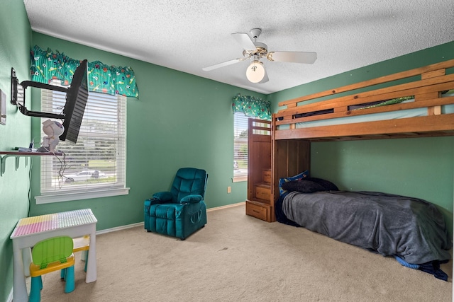 10201 Buffalo Grove Rd, Fort Worth, TX 76108 - bedroom featuring a textured ceiling, carpet floors, baseboards, and a ceiling fan